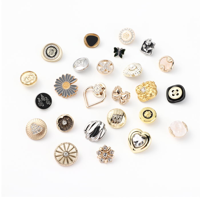 Assorted metal buttons in silver, gold and gunmetal finishes