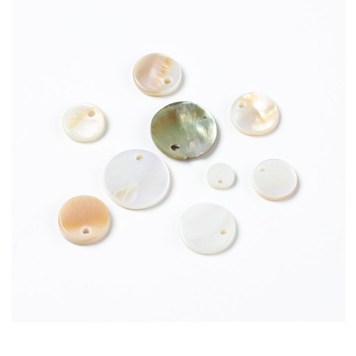Assorted natural shell, corozo and horn buttons