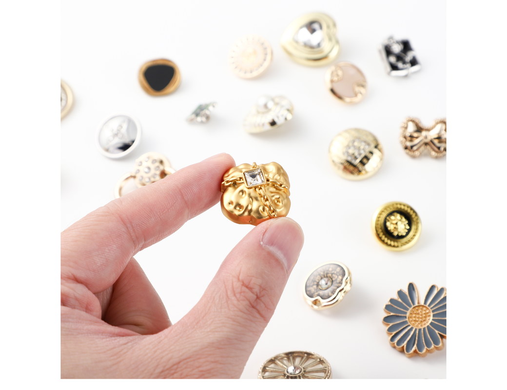 Custom metal buttons made by YUANXU GARMENTS CO., LTD, a source button factory in Ruian, Wenzhou, China
